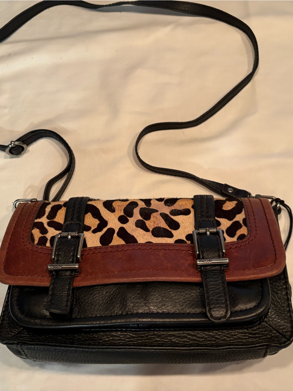 The Sak Woman’s Leather Crossbody Bag with animal print